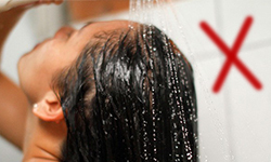 Avoid using extra hot water to wash your hair