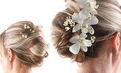 Slick bun with flowers