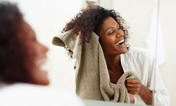 Lose the rough, regular towels for drying your curls